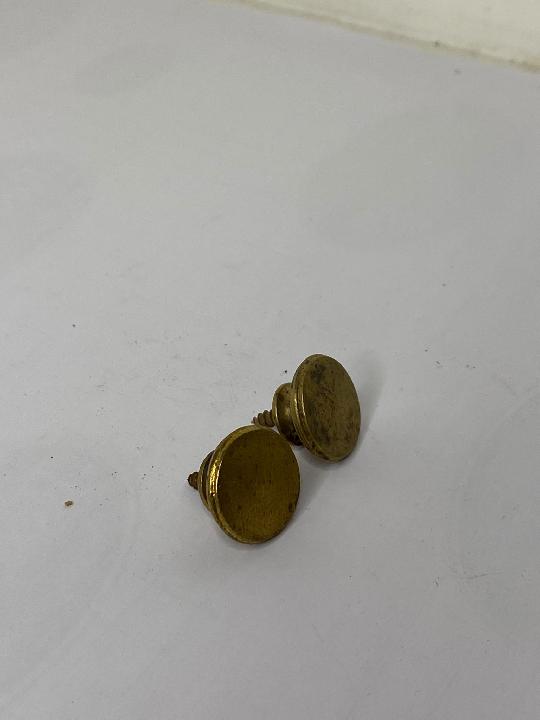 Tirador de botón