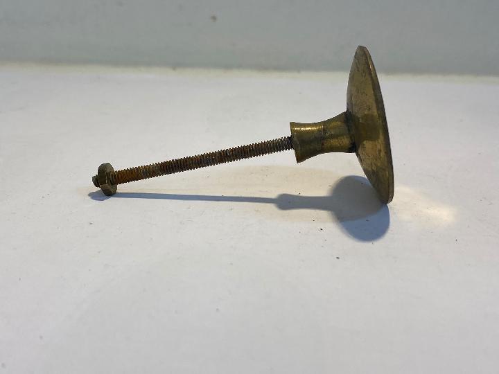 Tirador botón campana