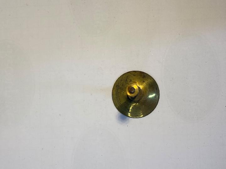 Tirador botón campana