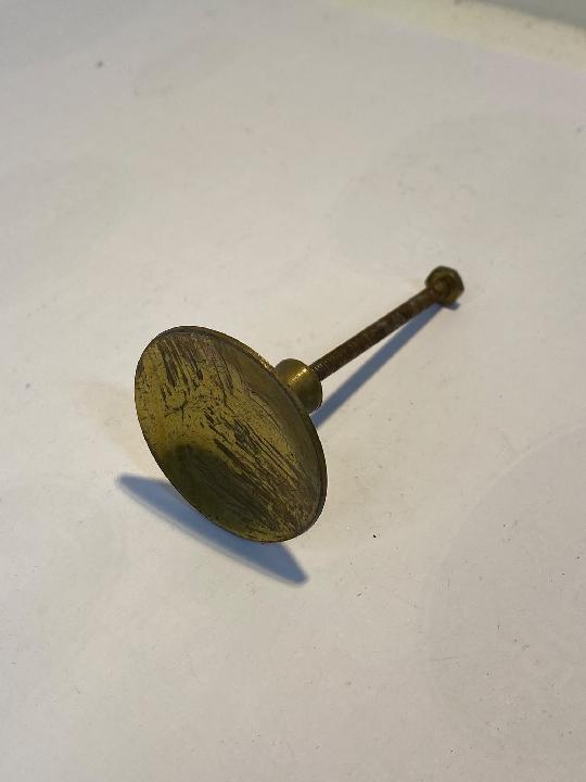 Tirador botón campana