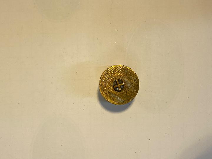 Tirador de botón